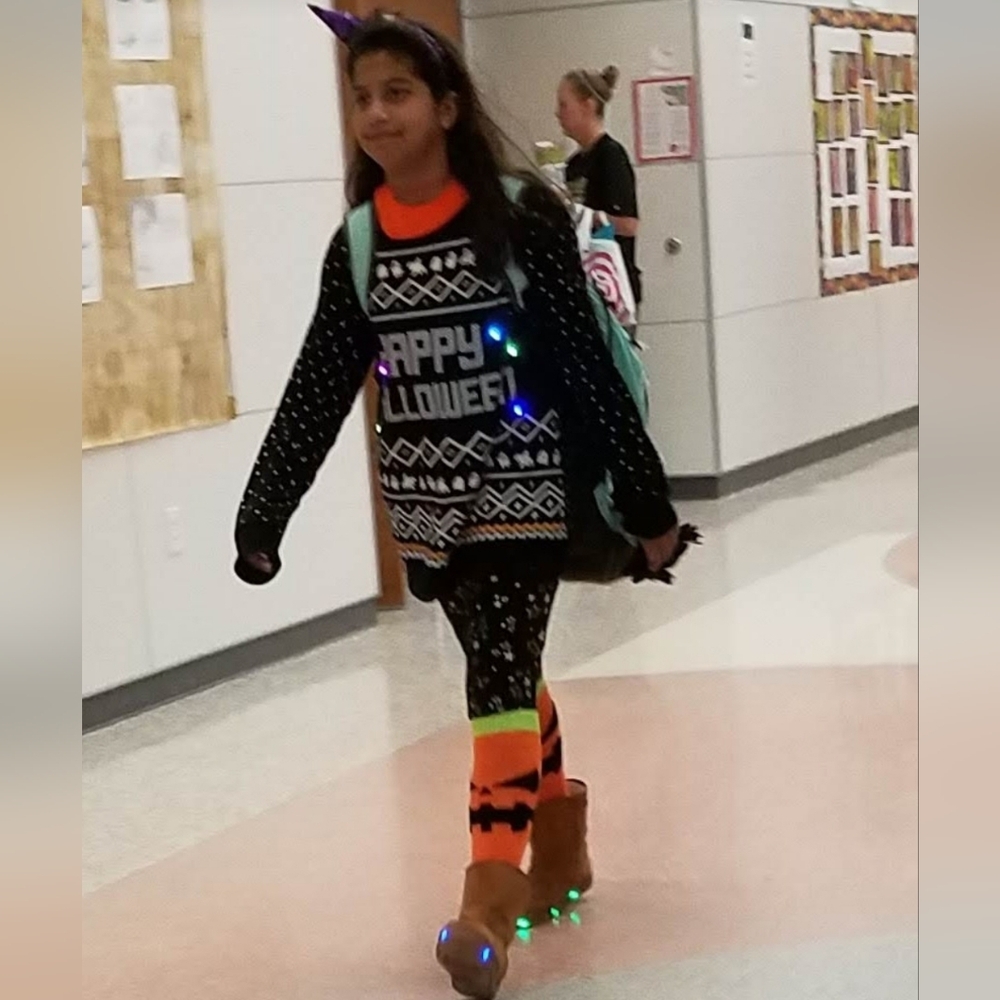 Light up Halloween sweaters for kids age 12 to 13 or petite used once